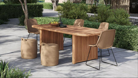Elegant outdoor dining set from Design Warehouse featuring a solid teak dining table with fluted details, woven chairs, and wicker ottomans. A perfect blend of outdoor furniture, style, and durability for patios and gardens.
